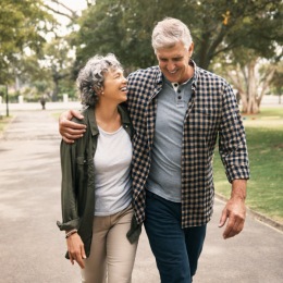 a couple walking in a park